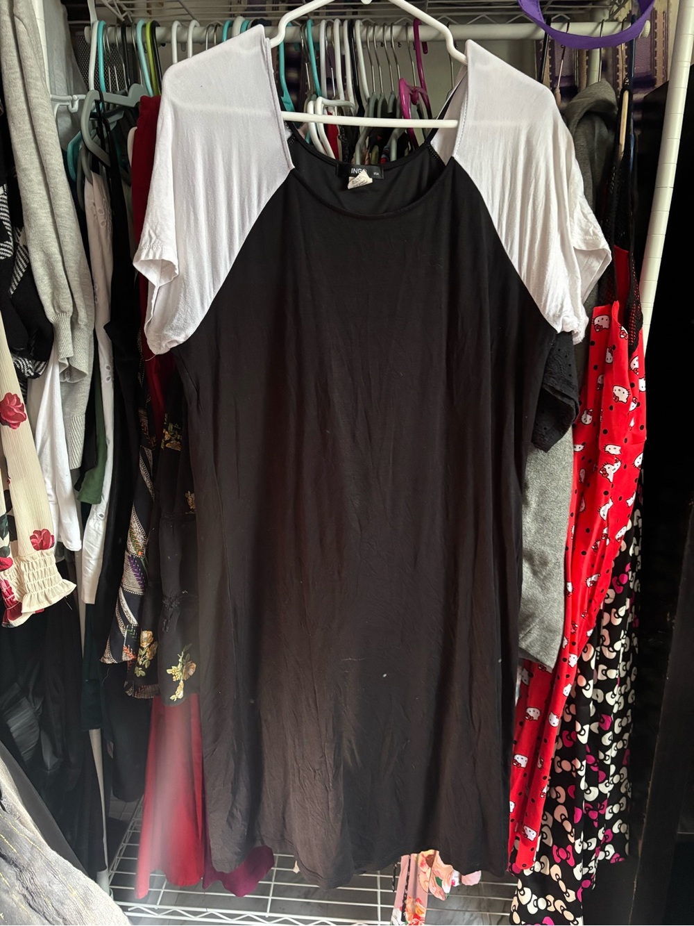 Ing Black Dress with White Raglan Sleeves